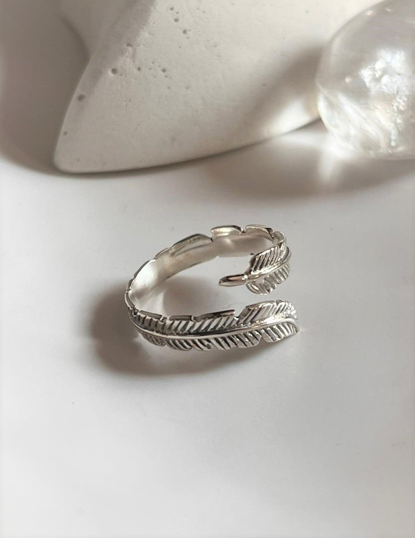 Charming feather wrap adjustable silver ring with a nature-inspired design
