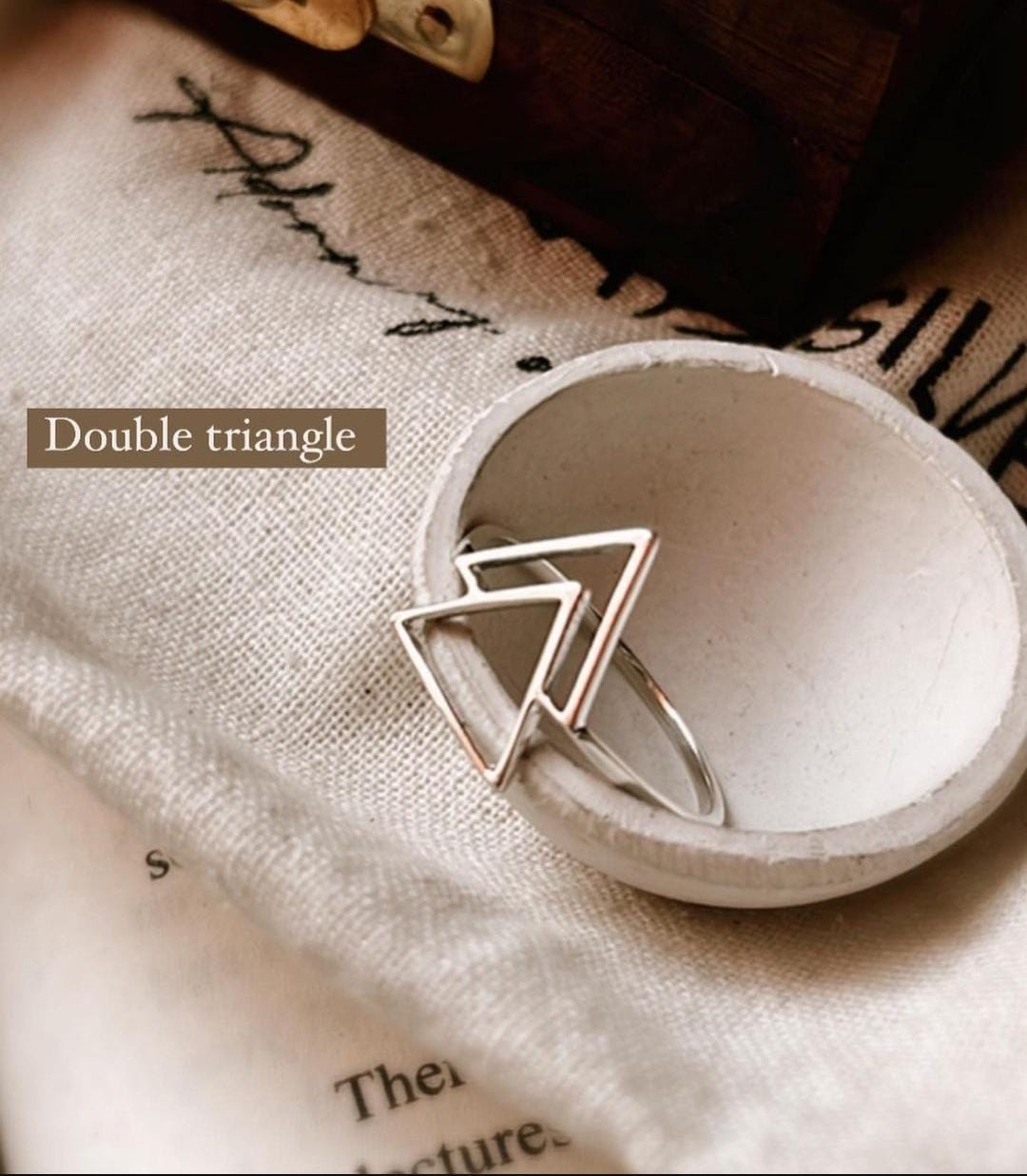 Chic double triangle silver ring with modern, minimalist appeal