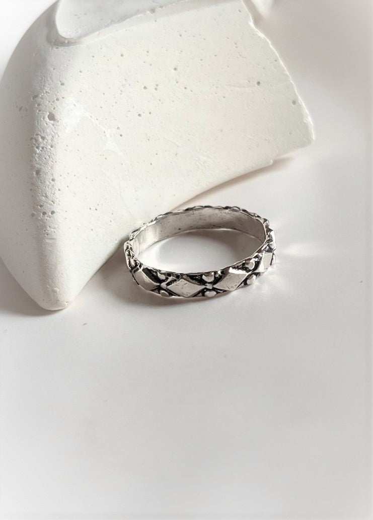 Unique tribal Rawa silver ring with band design