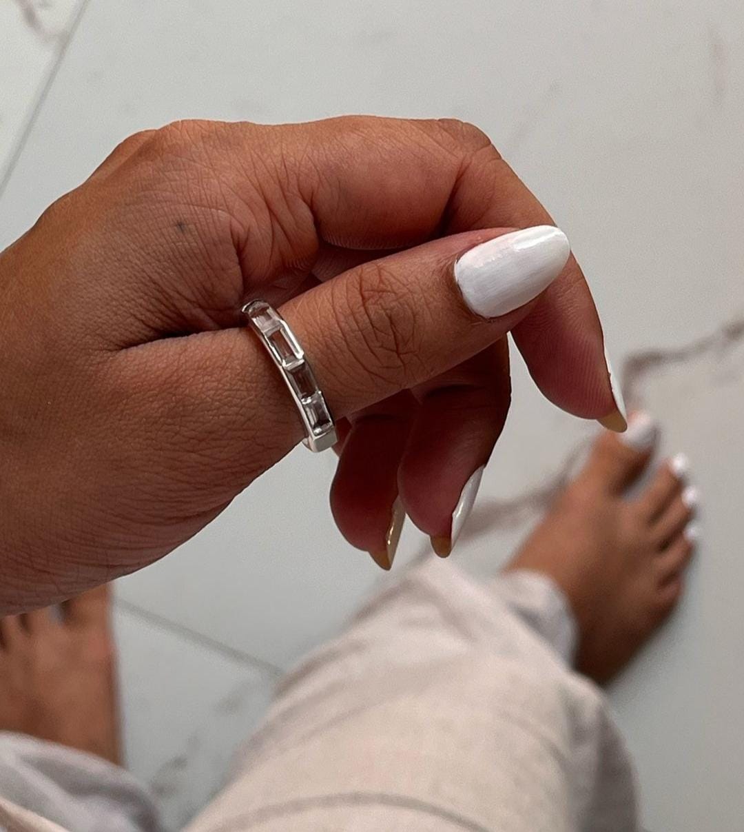 Elegant five stone silver ring featuring clear quartz gemstones