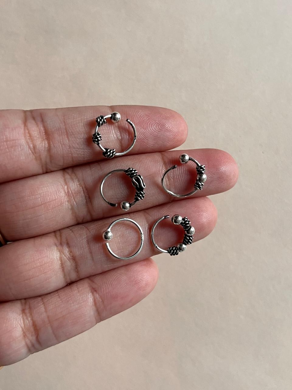 Set of 5 antique boho nose rings in sterling silver.