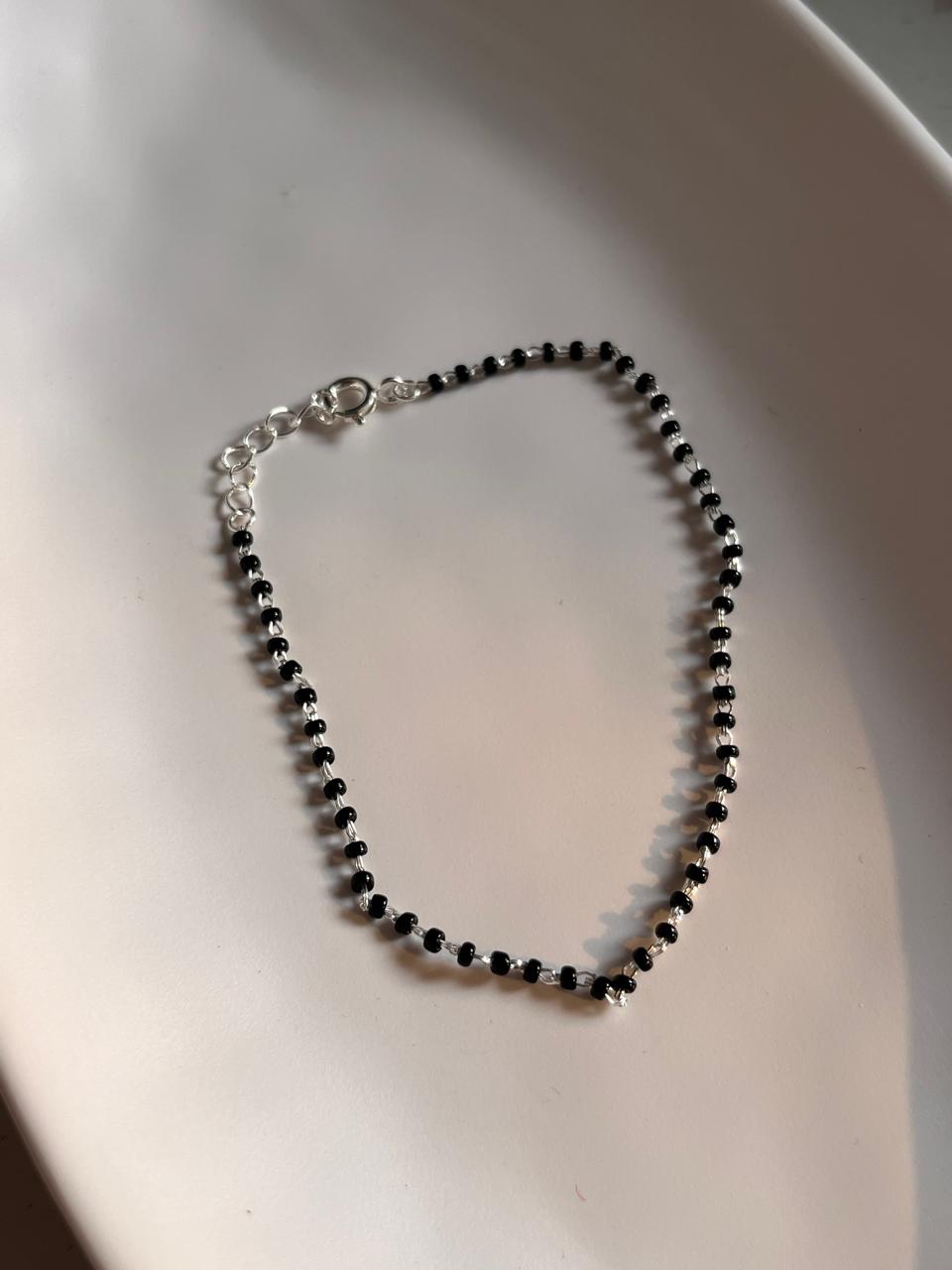 Silver Bracelet with Black Beads for Protection and Good Luck