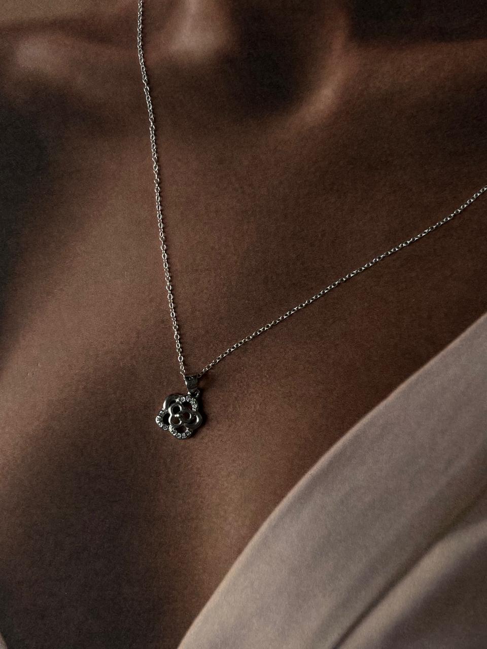 Handcrafted silver necklace with a beautiful rose charm