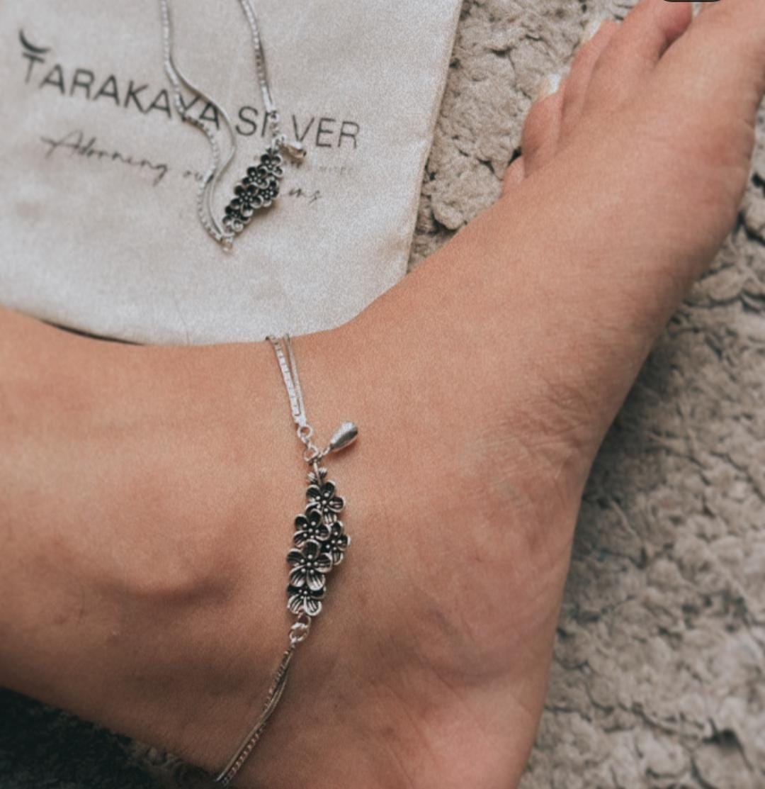 Unique floral drop silver anklet with vibrant flower-inspired charm