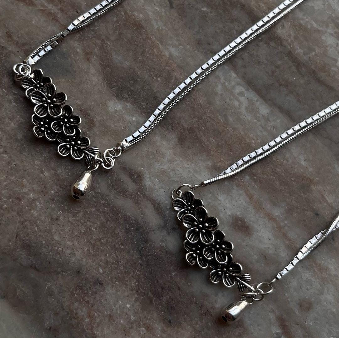 Unique floral drop silver anklet with vibrant flower-inspired charm