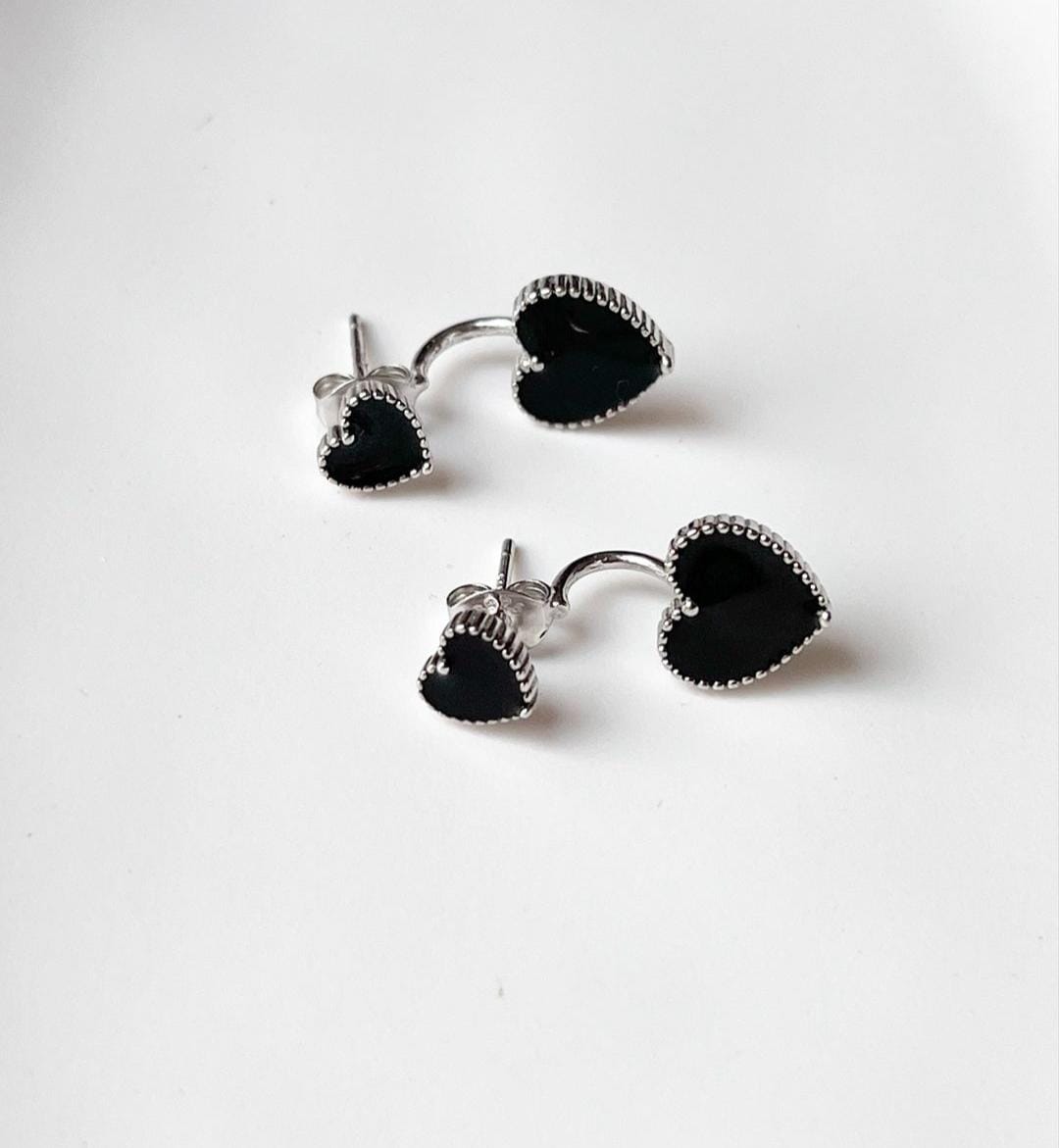 Unique black heart enamel silver earrings for a stylish statement.
