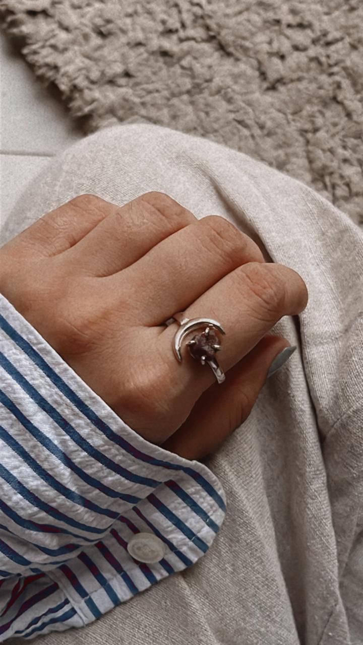 Garnet moon-shaped silver ring with an adjustable band