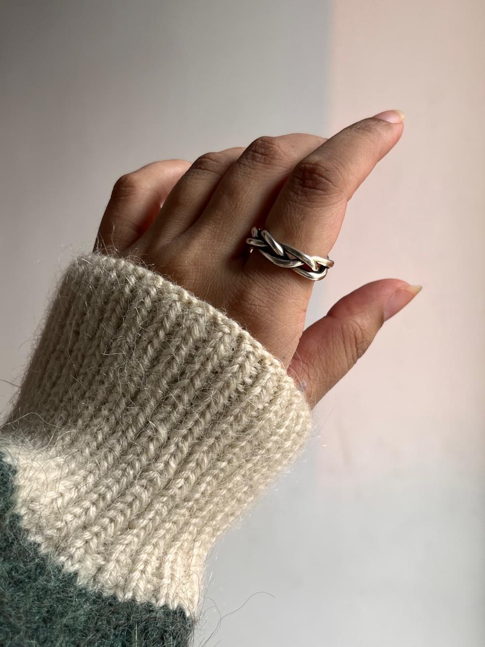 Chunky silver 925 ring with adjustable band and braided twist design