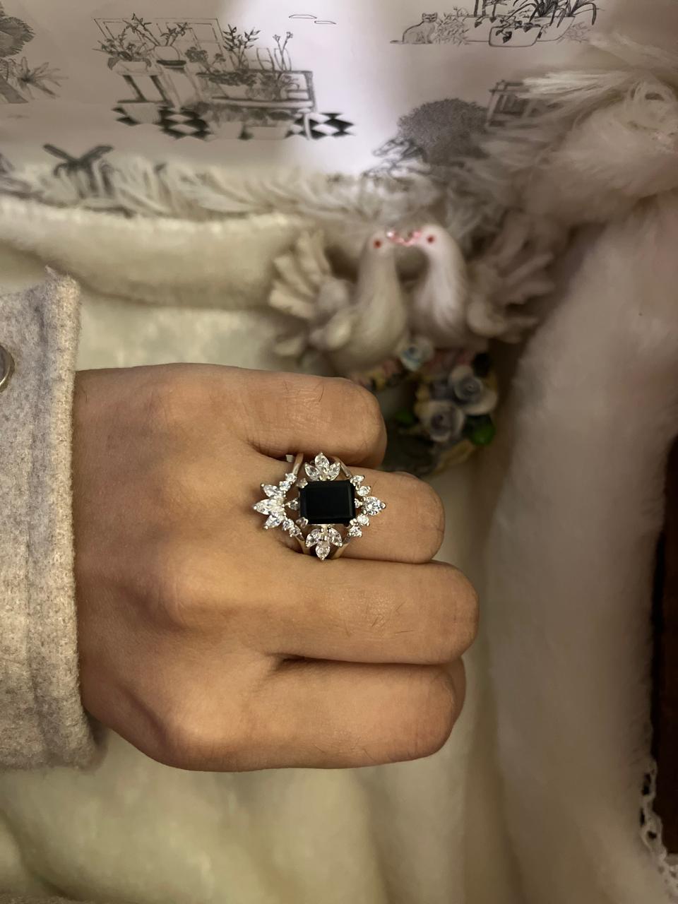 Sleek Silver Solitaire Ring with Black Onyx Stone