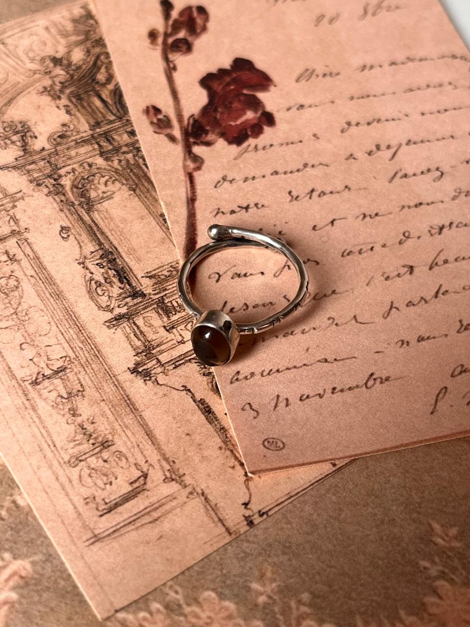 Adjustable silver ring with tribal design and smokey quartz