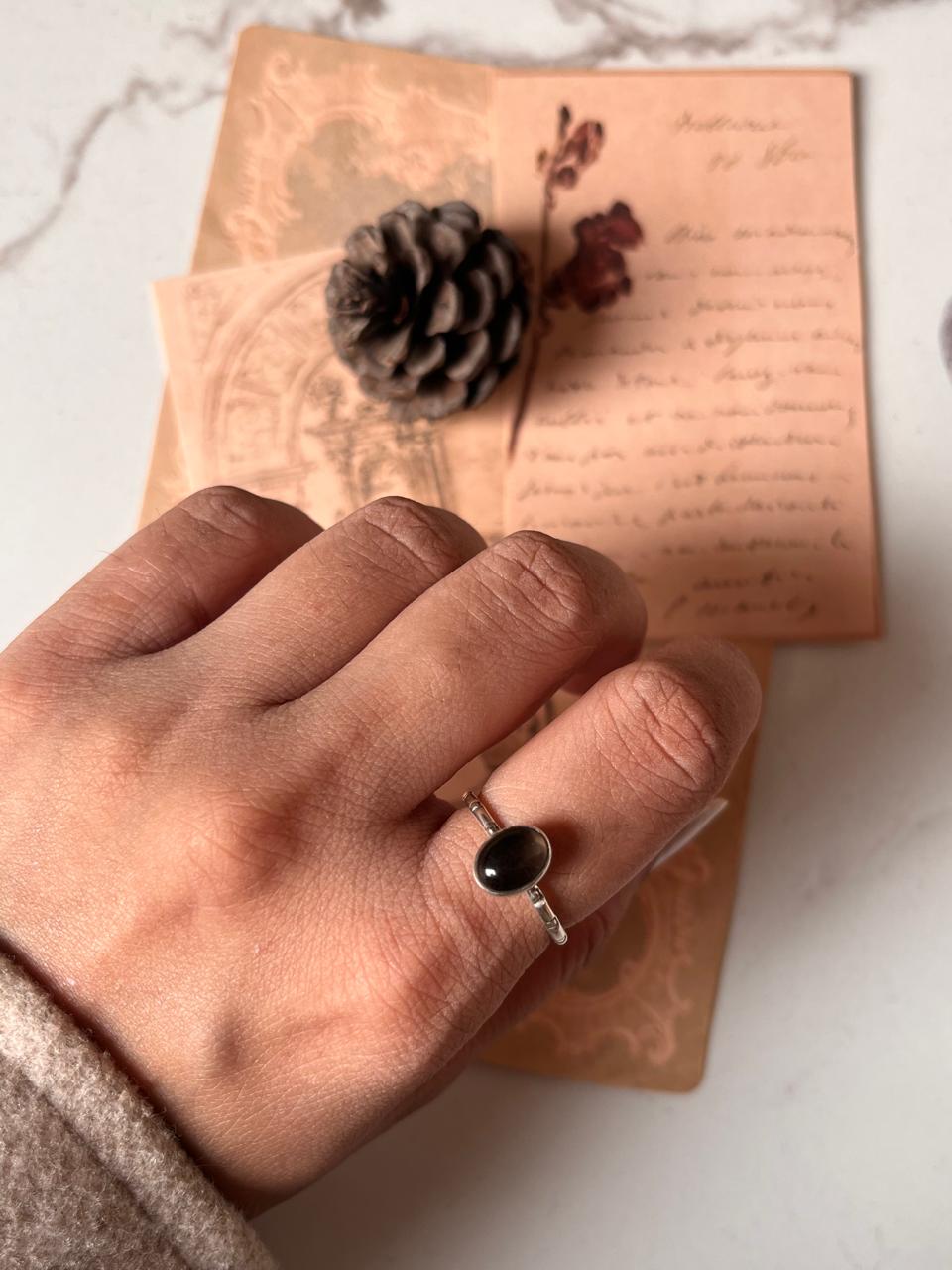 Smokey quartz oval ring with tribal engravings in silver
