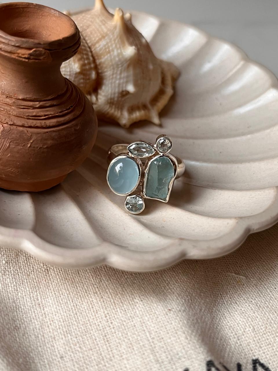 Elegant stone aquamarine and blue topaz cluster ring in silver