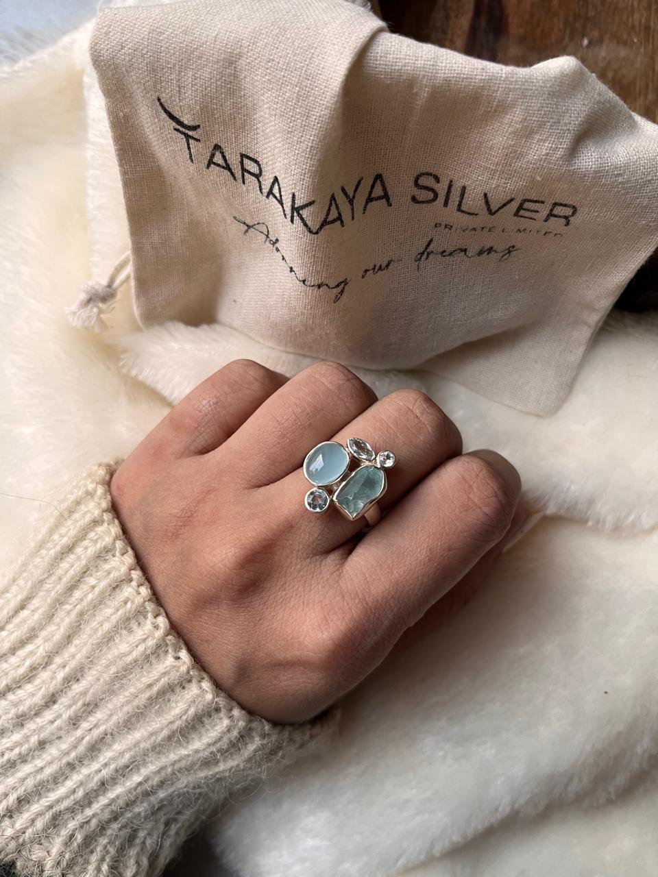 Sterling silver ring with aquamarine and blue topaz cluster design