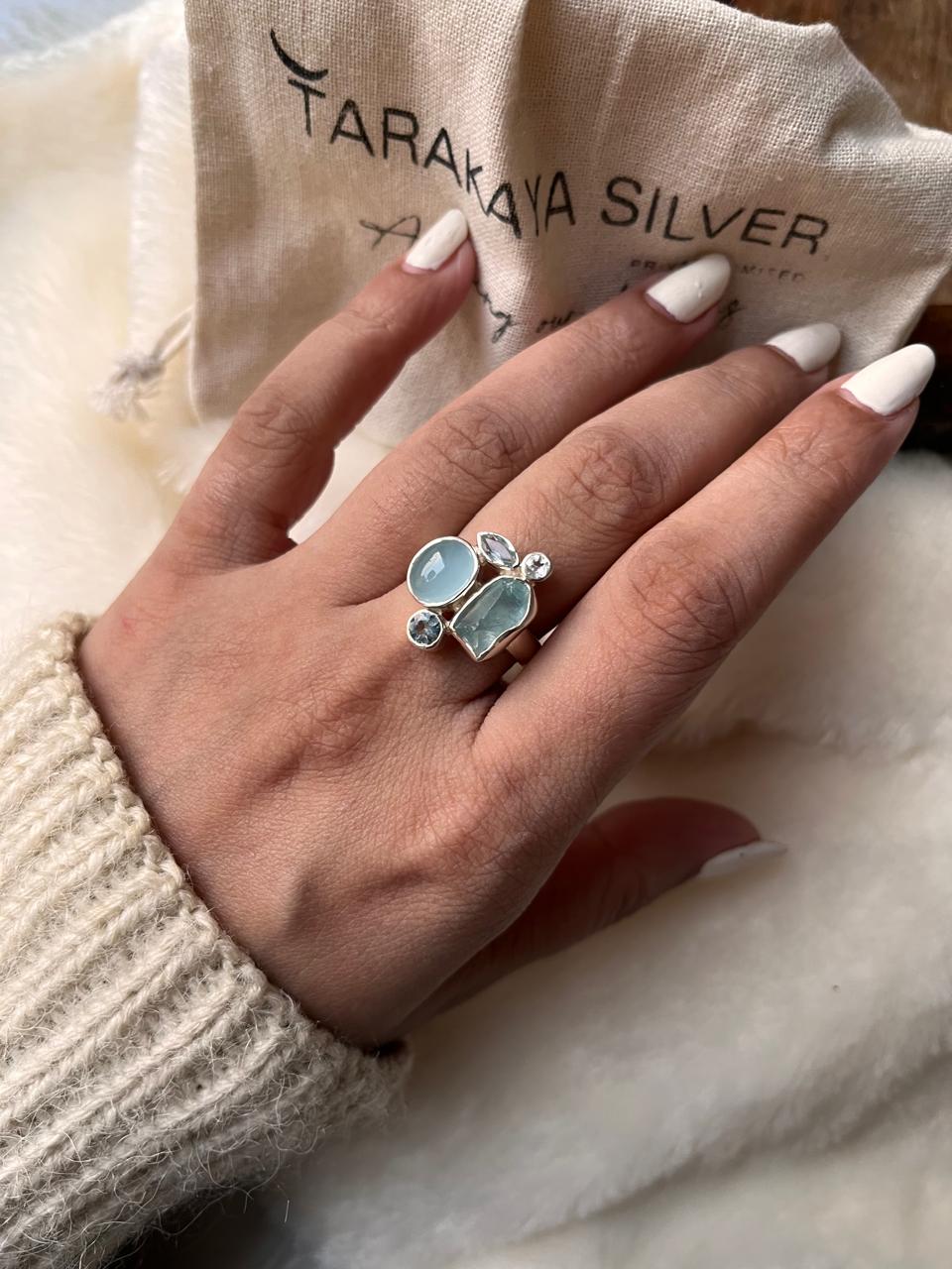 925 silver ring featuring aquamarine and blue topaz cluster of 4 stones