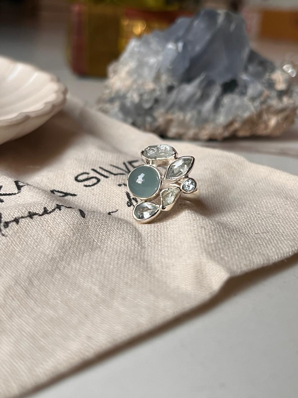 925 silver ring featuring aquamarine and blue topaz cluster stones