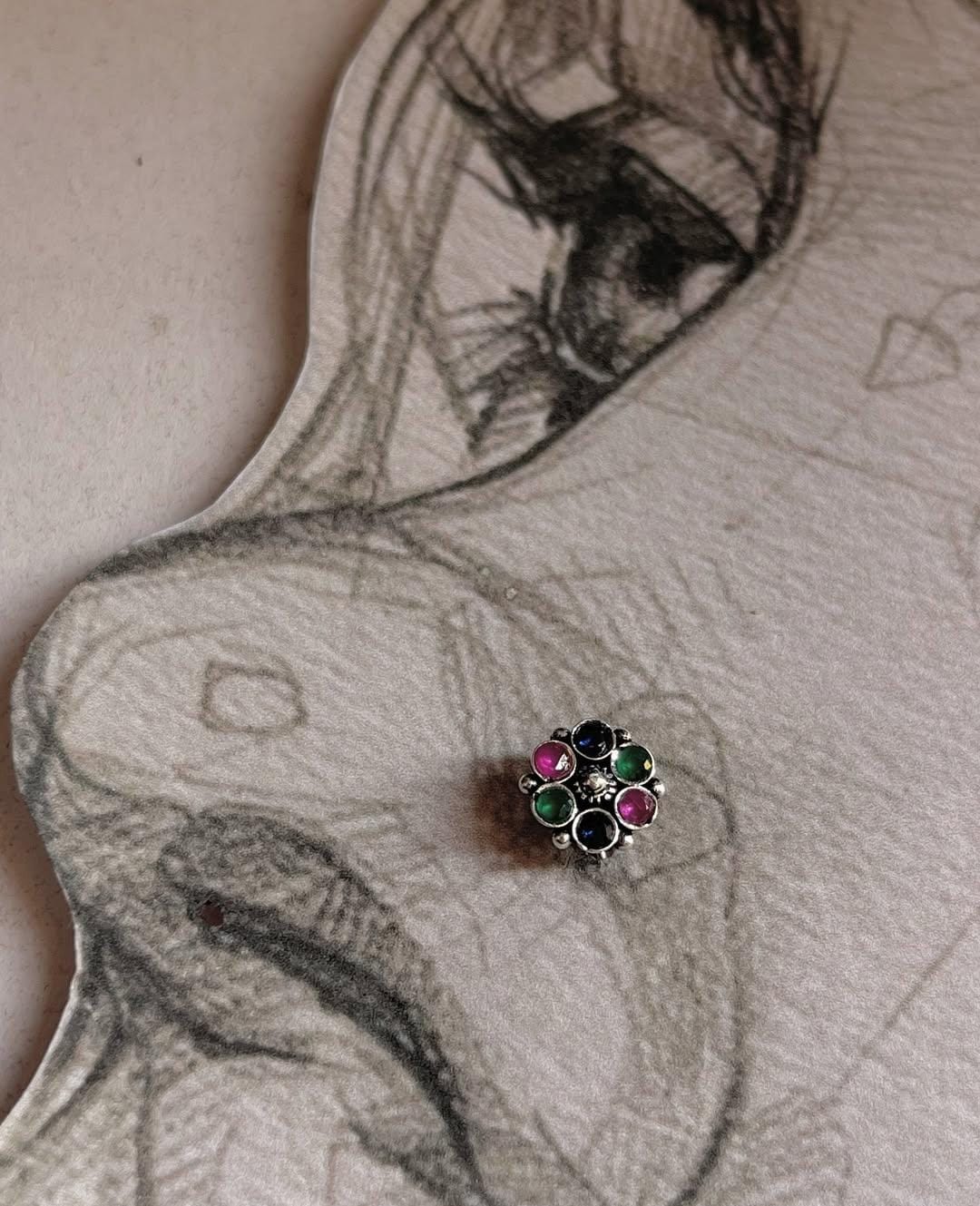 925 silver nose pin with tribal rawa design and multi CZ stones