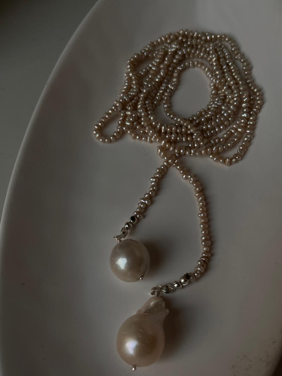 Close-up of Basra pearl knot necklace with lustrous pearls