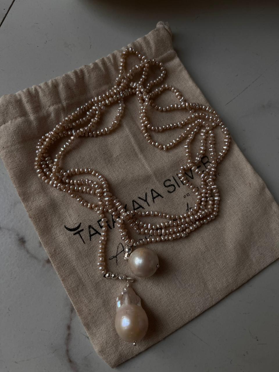 Luxury Basra pearl necklace featuring a classic knot design