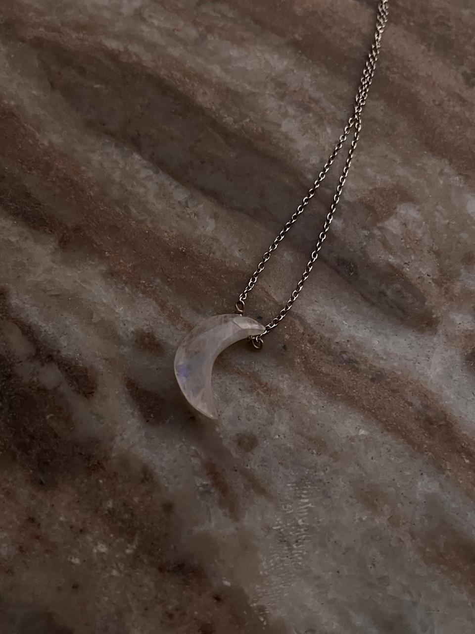 Charming Moonstone crescent moon necklace with crystal embellishments in silver