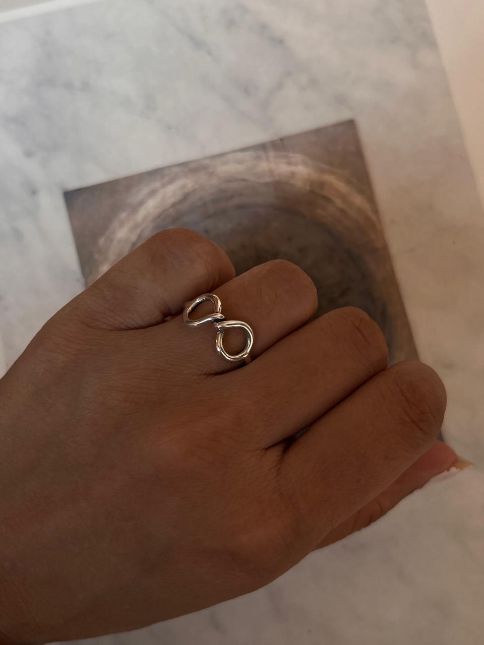 Sterling silver ring with infinity twist design