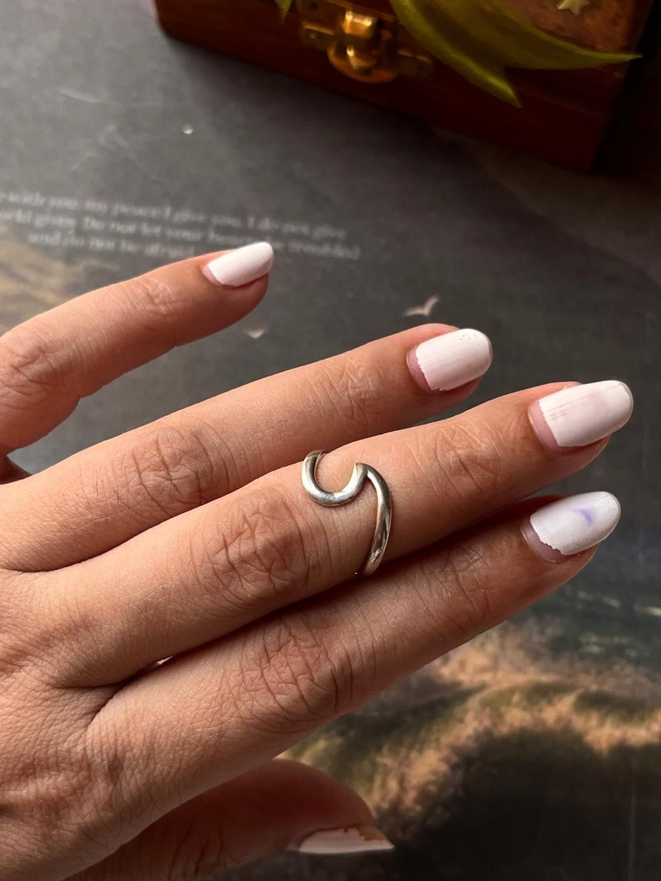 Handmade silver ring with beach wave design