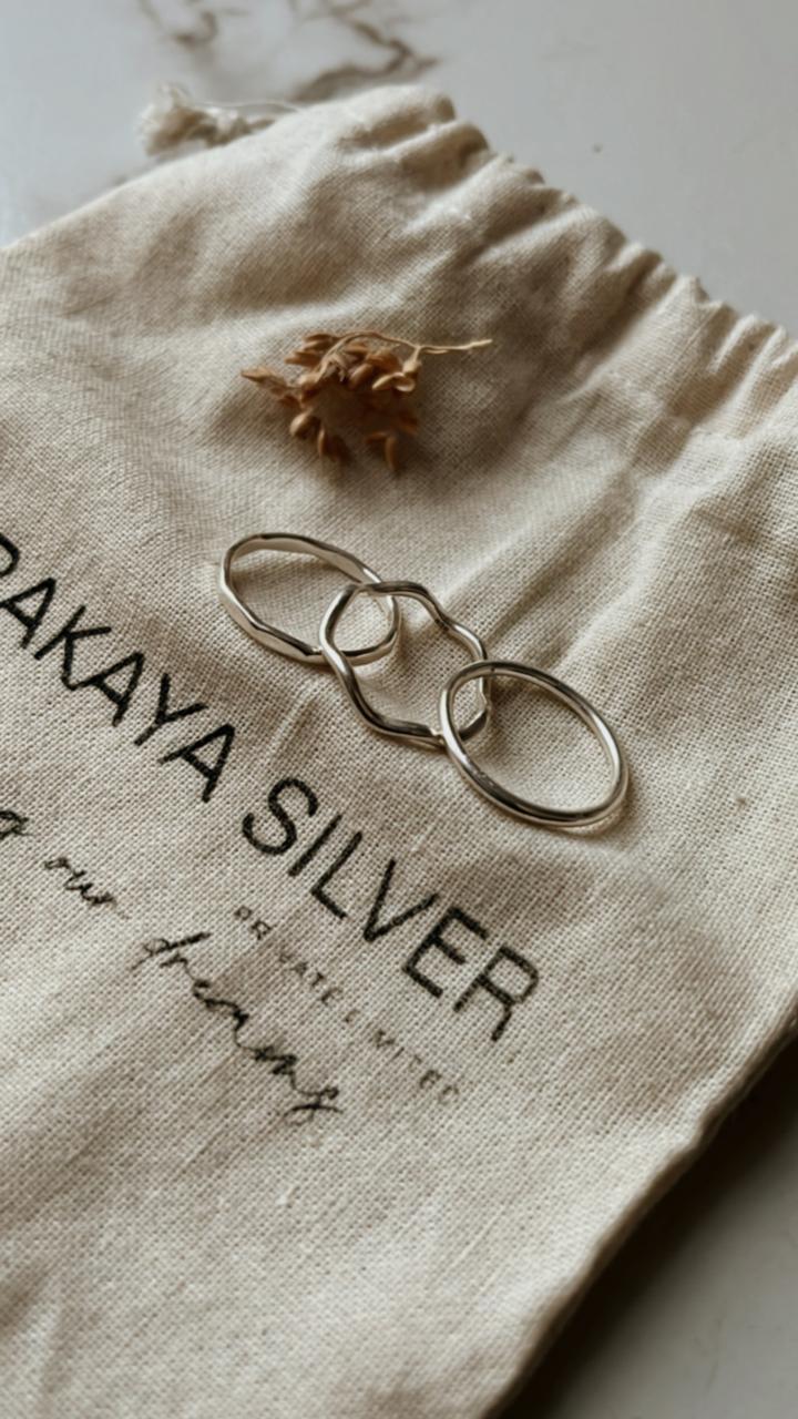 Wavy plain and hammered band silver ring stack set