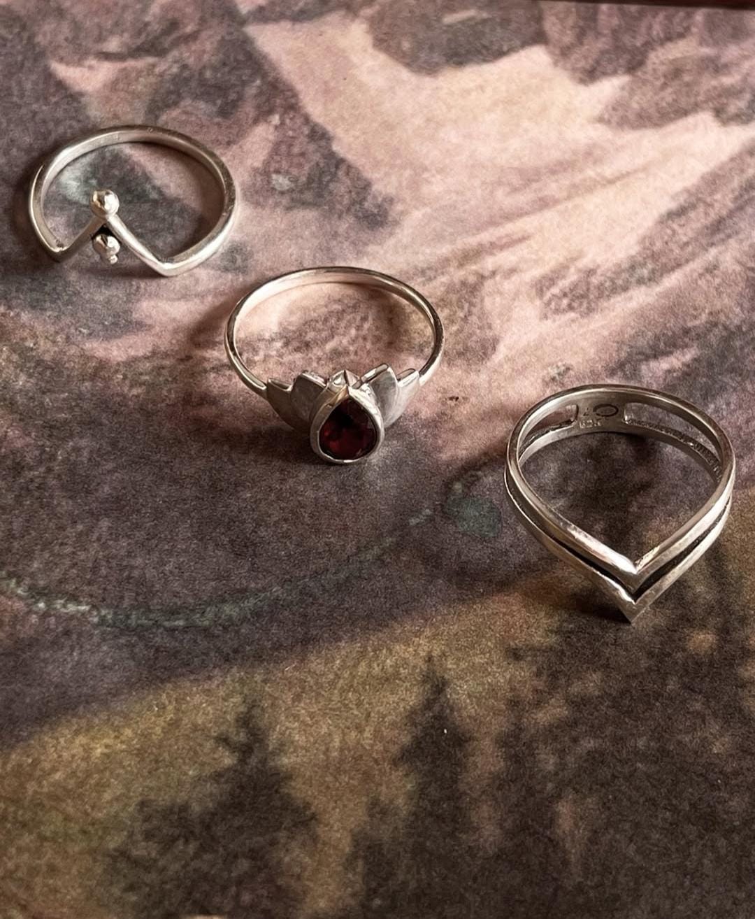 Garnet gemstone stackable rings in sterling silver with Lotus design