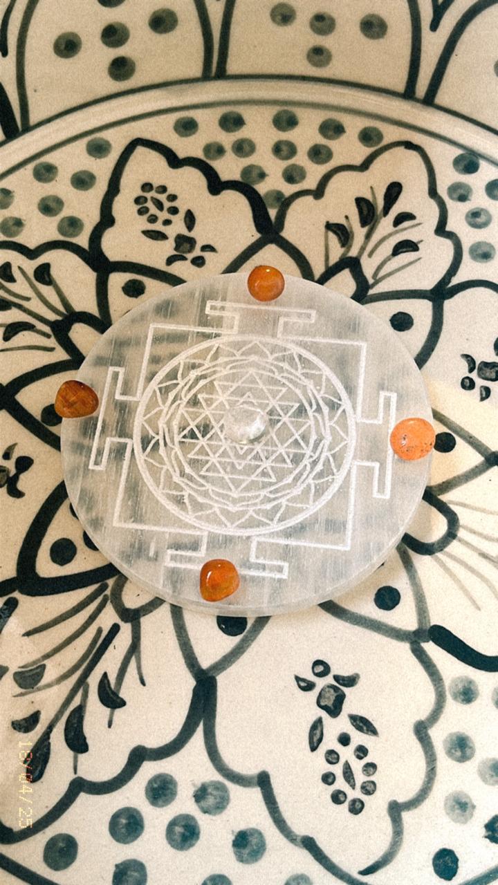 Energy-charged selenite plate featuring Shree Yantra