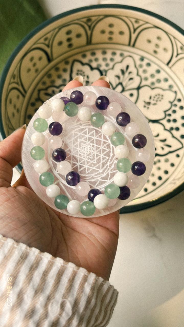 Sacred Shree Yantra symbol on selenite charging plate