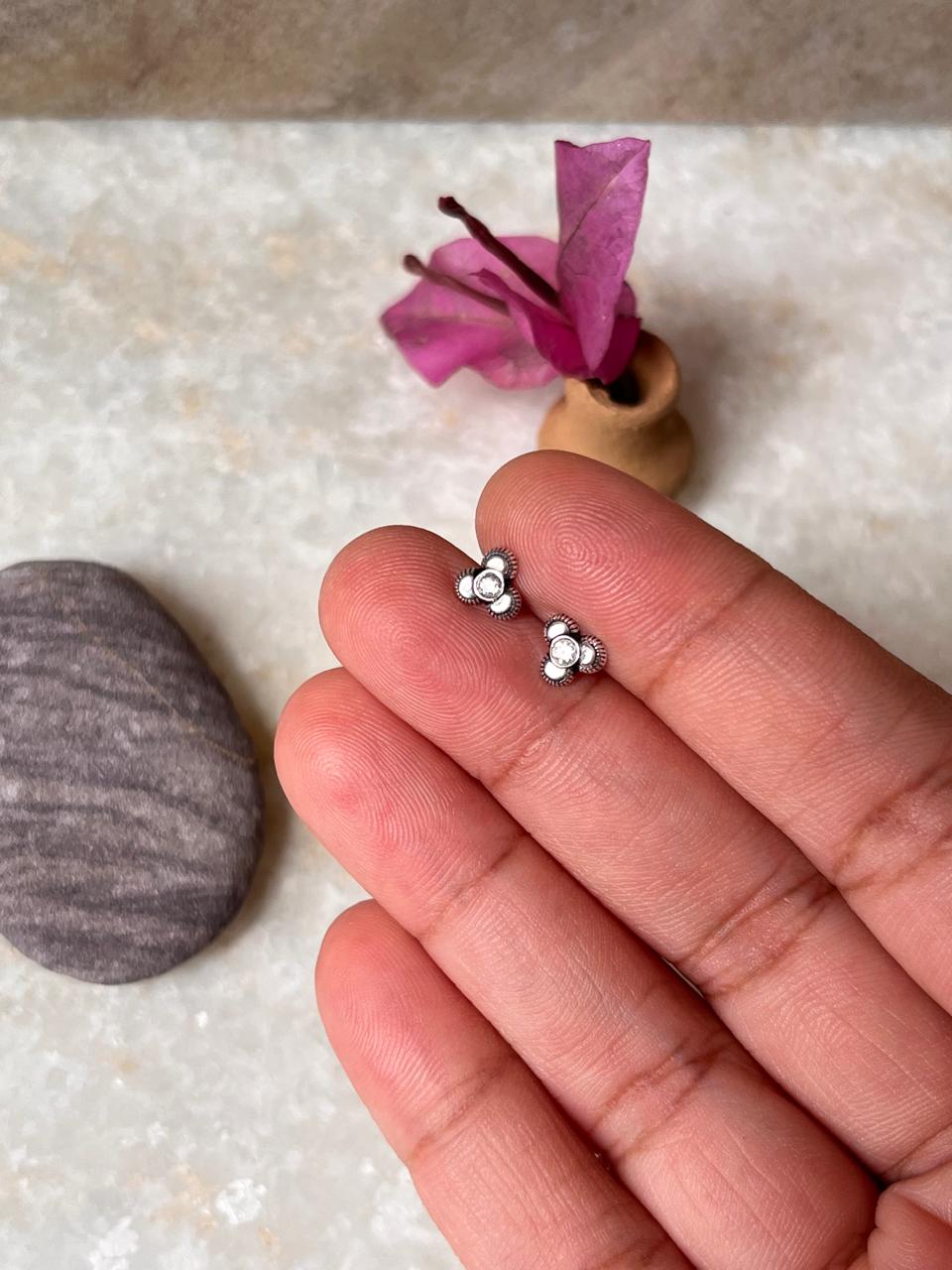 Trendy sterling silver flower earrings with white CZ stones