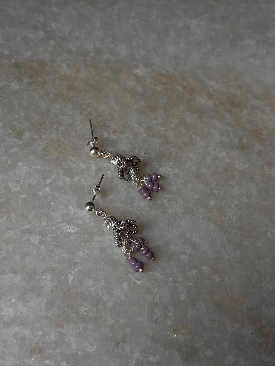Ethnic silver jhumka earrings with lavender tones