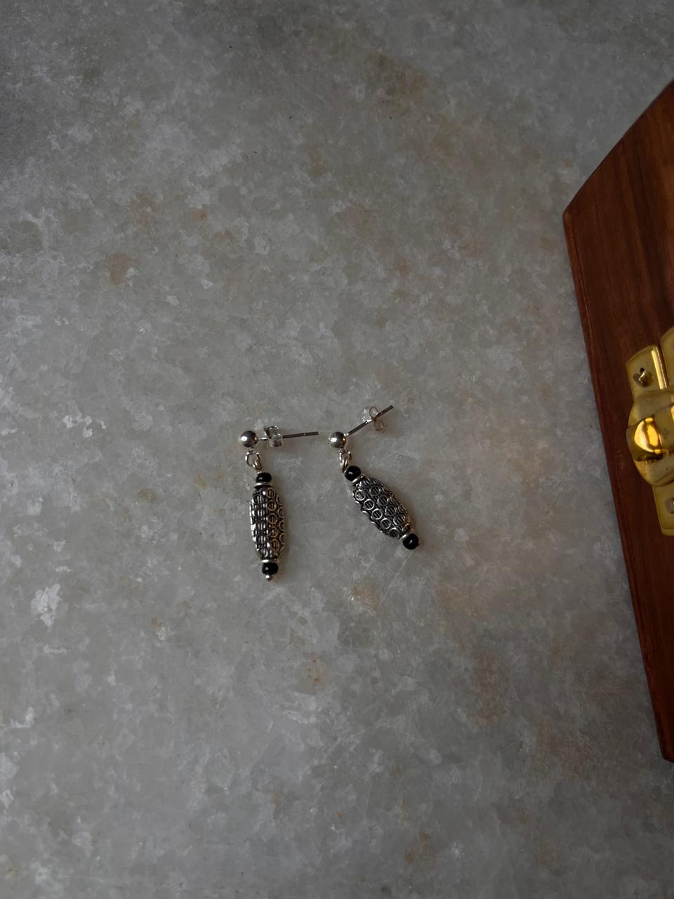 Minimalist black bead earrings in sterling silver