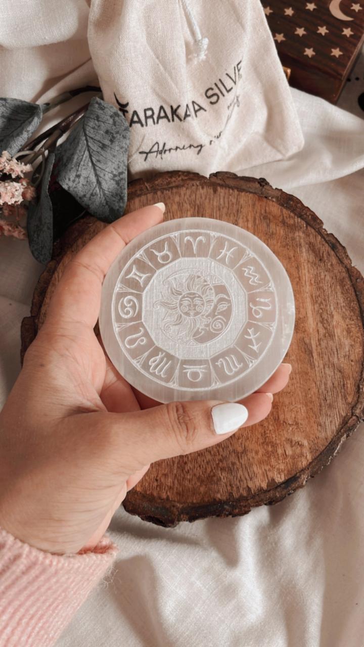 Zodiac-themed selenite charging plate for crystal cleansing