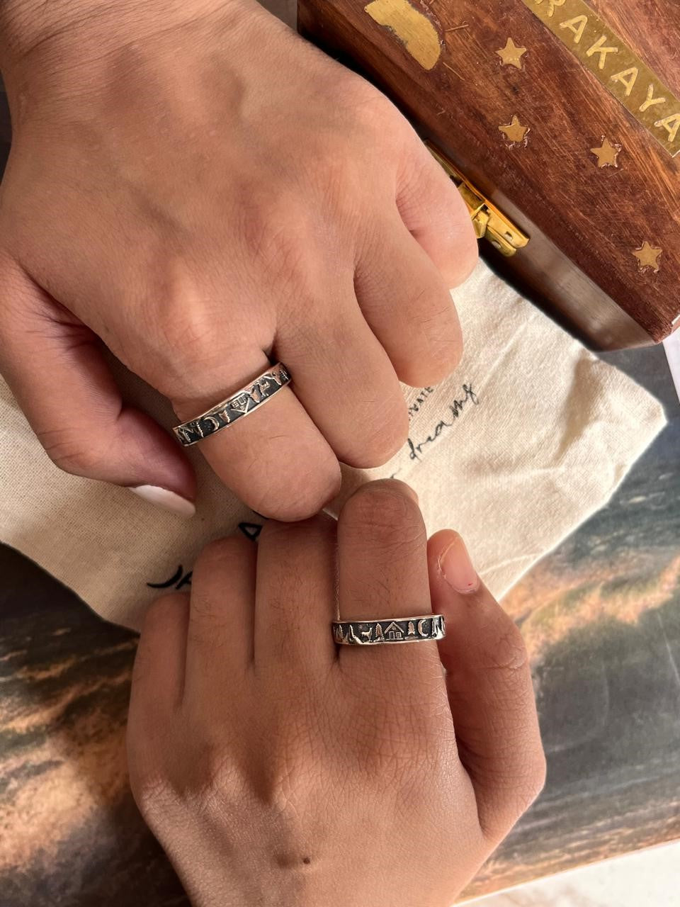 Forest reindeer moon cottage design on an adjustable couple’s silver ring