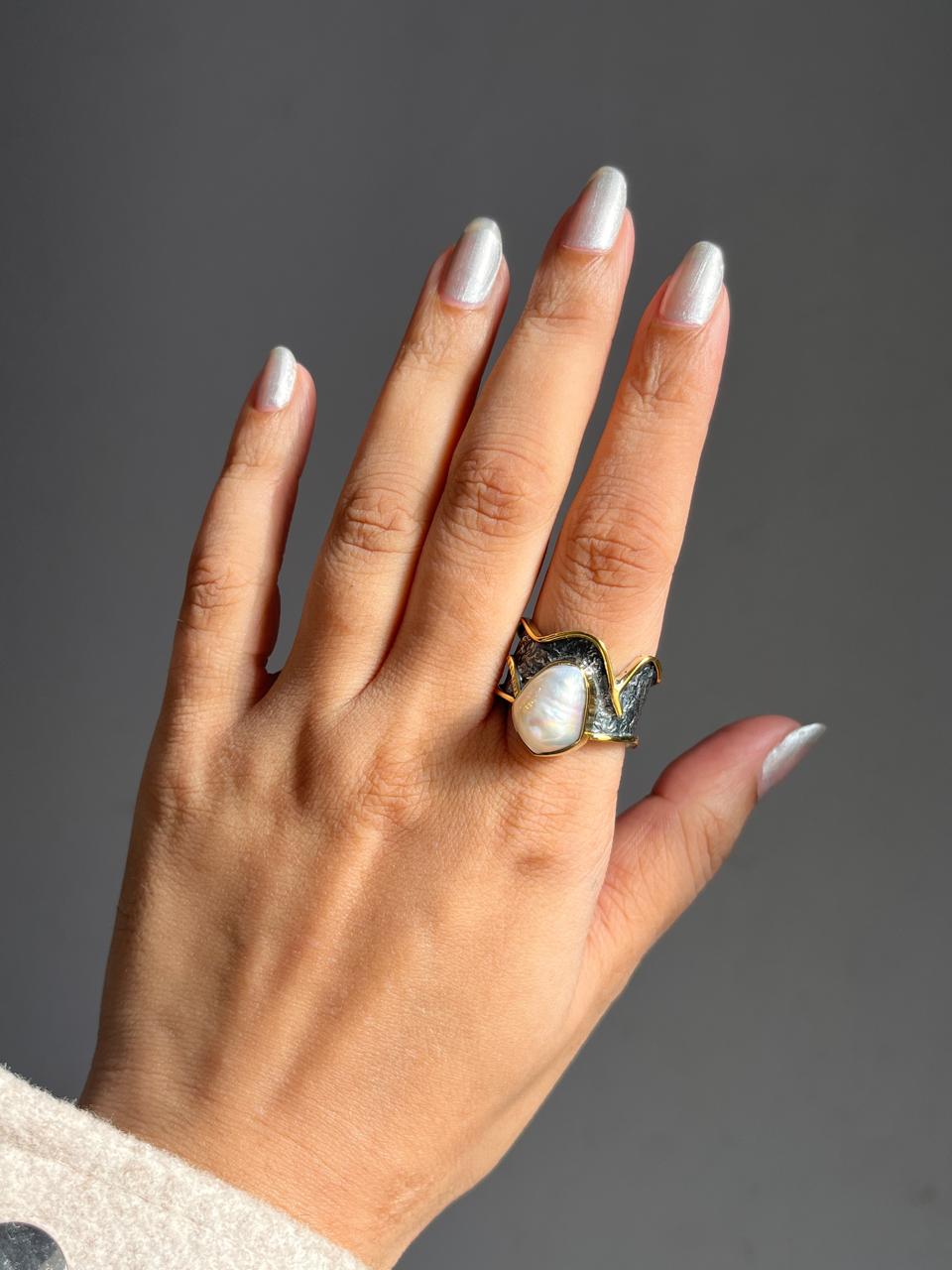 Rustic 1 silver ring showcasing a natural Baroque pearl.