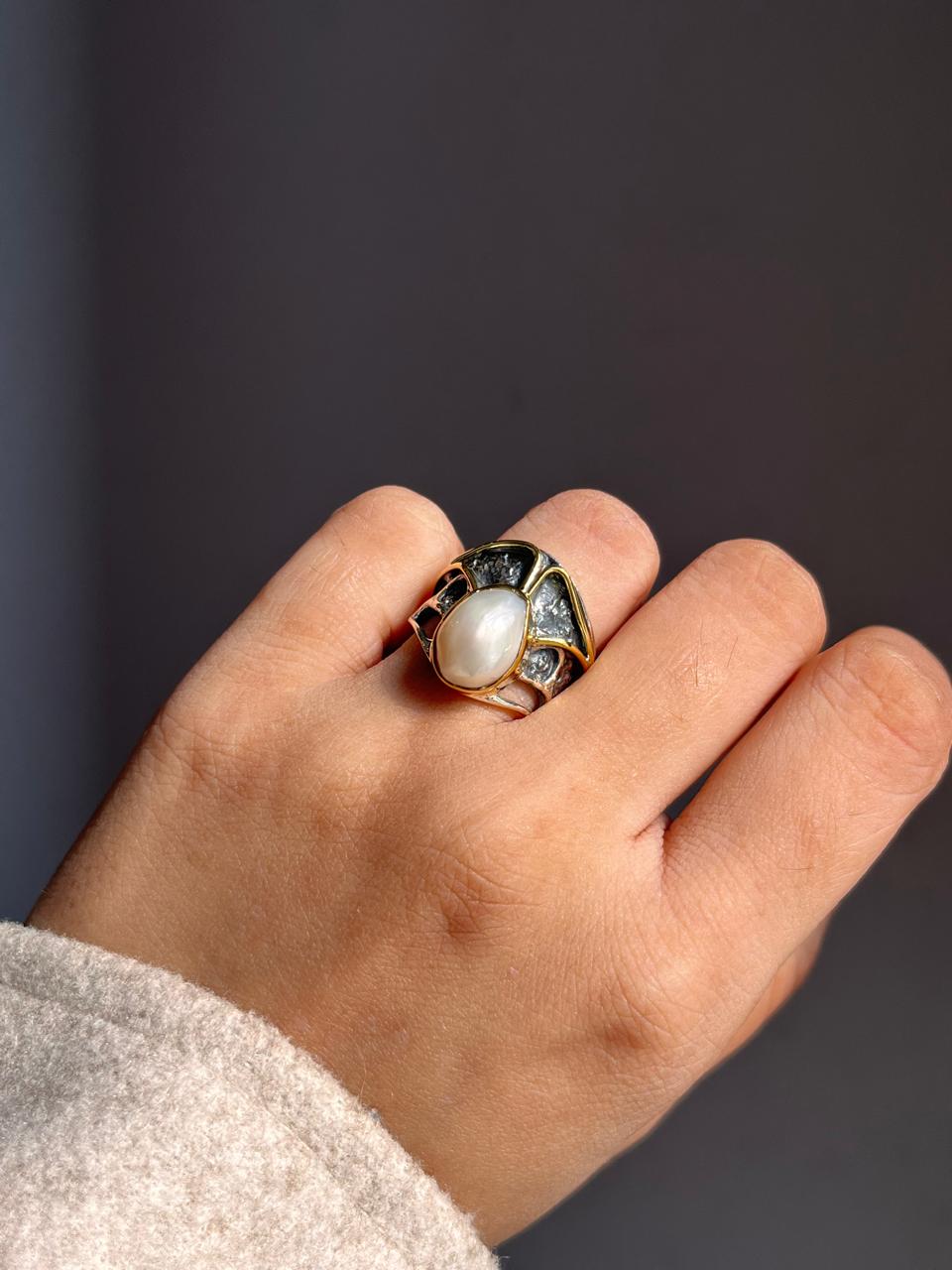 Boho-style Baroque pearl rustic 2 silver ring with intricate detailing.