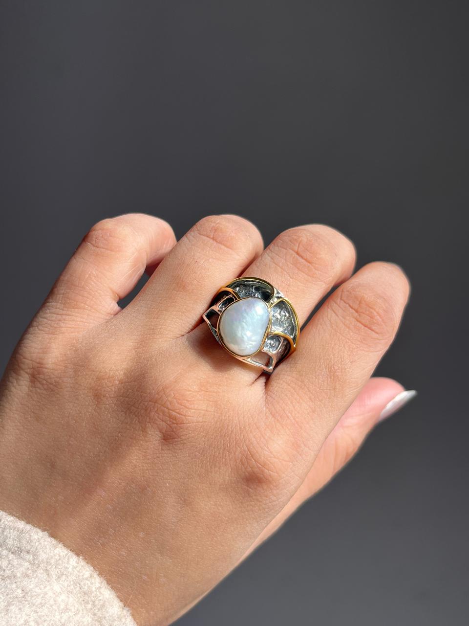 Sophisticated rustic silver ring featuring two stunning Baroque pearls.