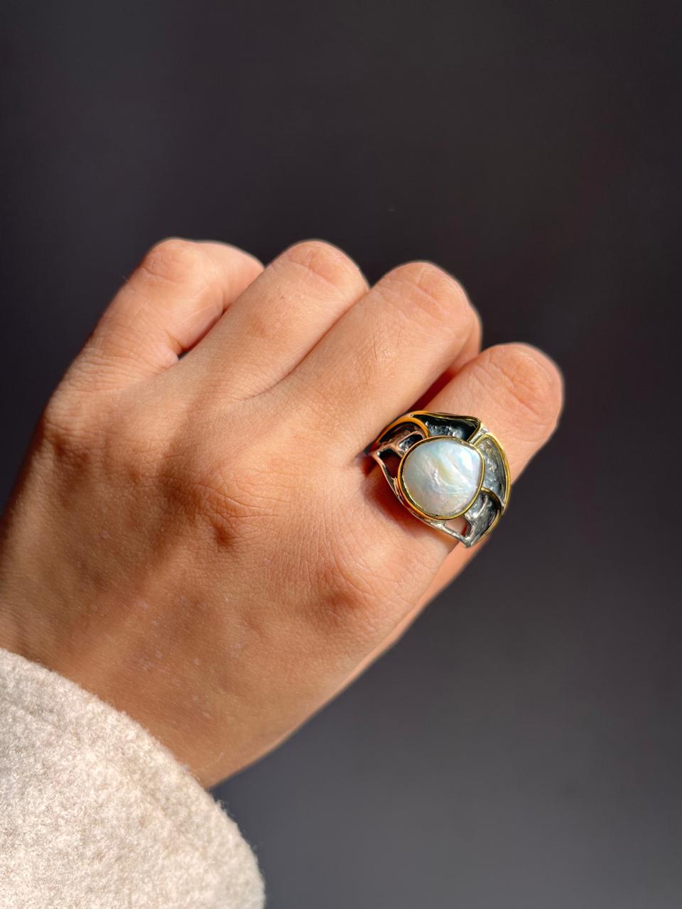 Timeless rustic 2 silver ring showcasing two beautiful Baroque pearls.