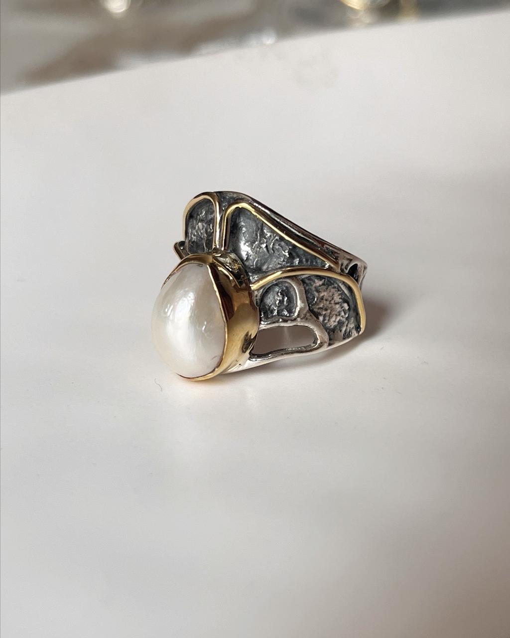 Timeless rustic 2 silver ring showcasing two beautiful Baroque pearls.