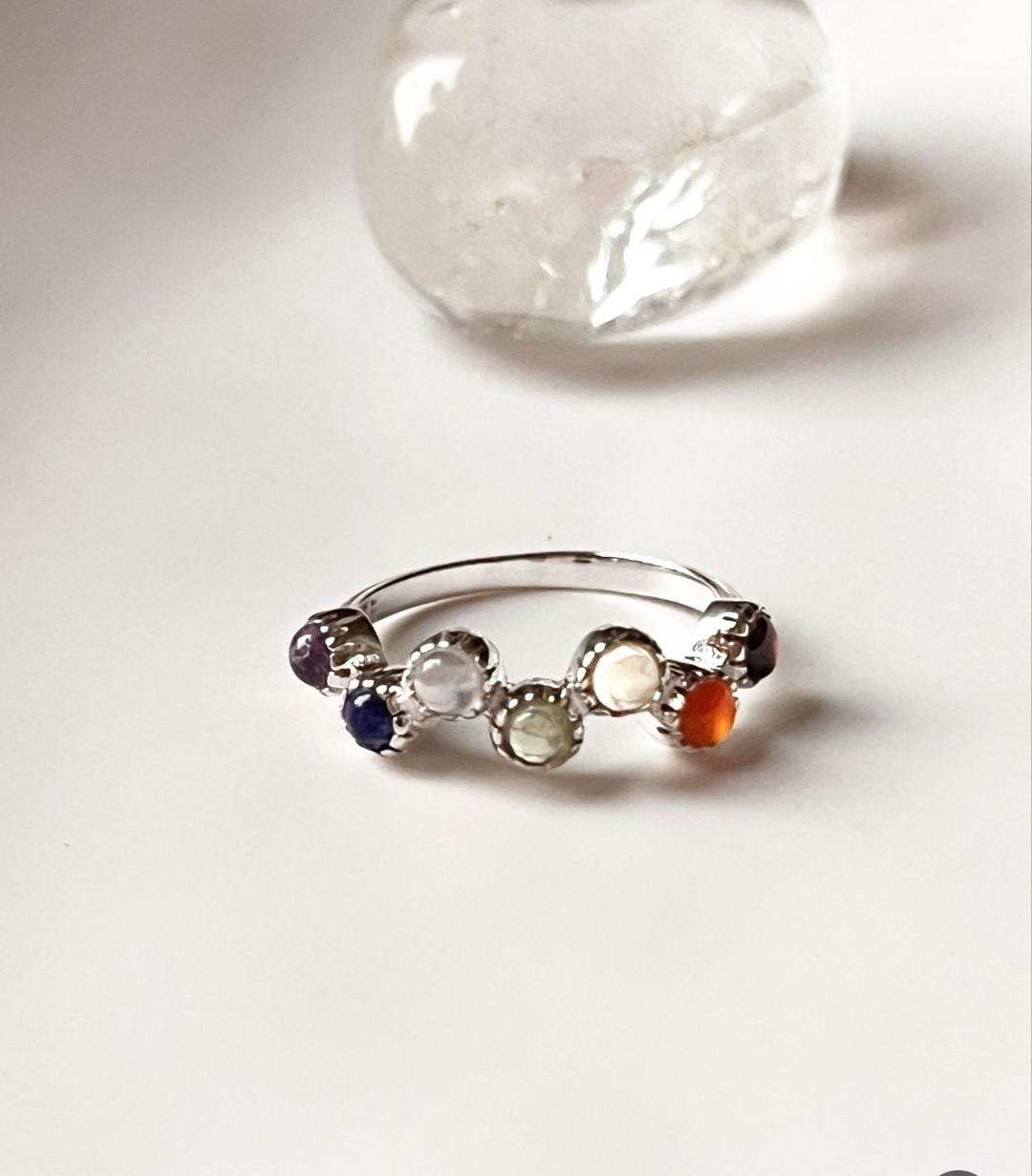 Timeless silver band ring with seven chakra stones for healing