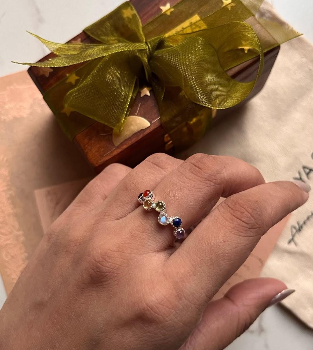 Handcrafted seven chakra silver band ring for energy balance