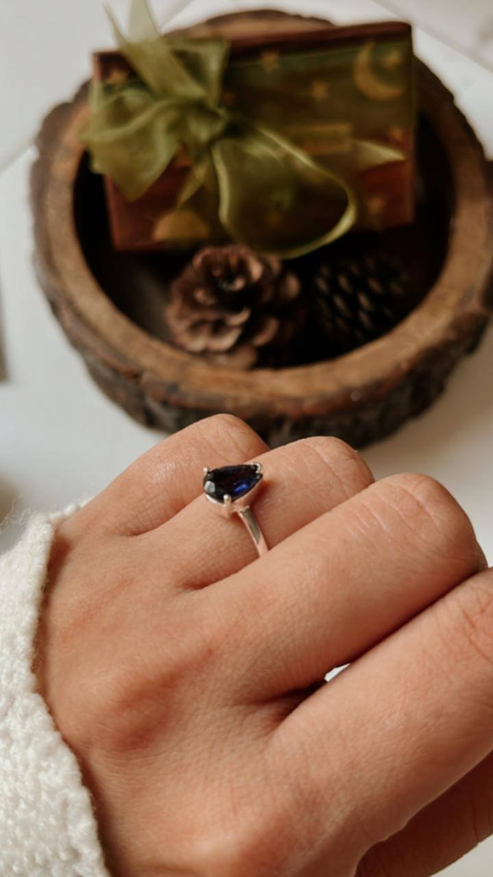 Iolite Solitaire Pear Silver Ring in a polished silver setting