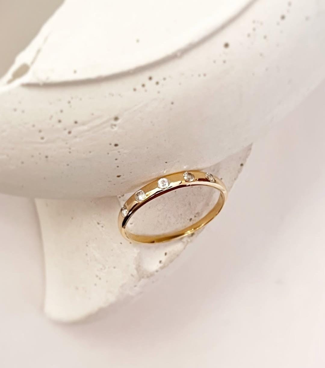 Gold Vermeil ring with white topaz and Eclipse band design