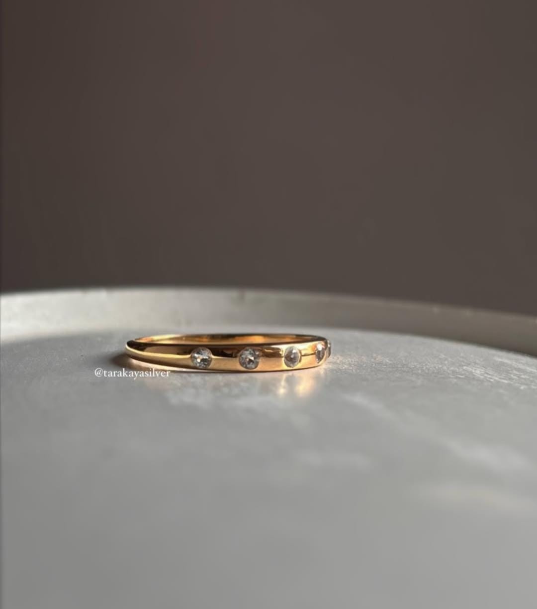 Elegant Gold Vermeil band ring with white topaz in Eclipse design