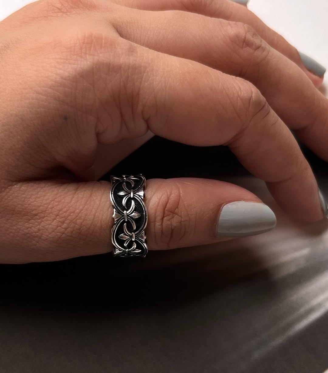 Sterling Silver Fleur De Lis Ring with Black Band