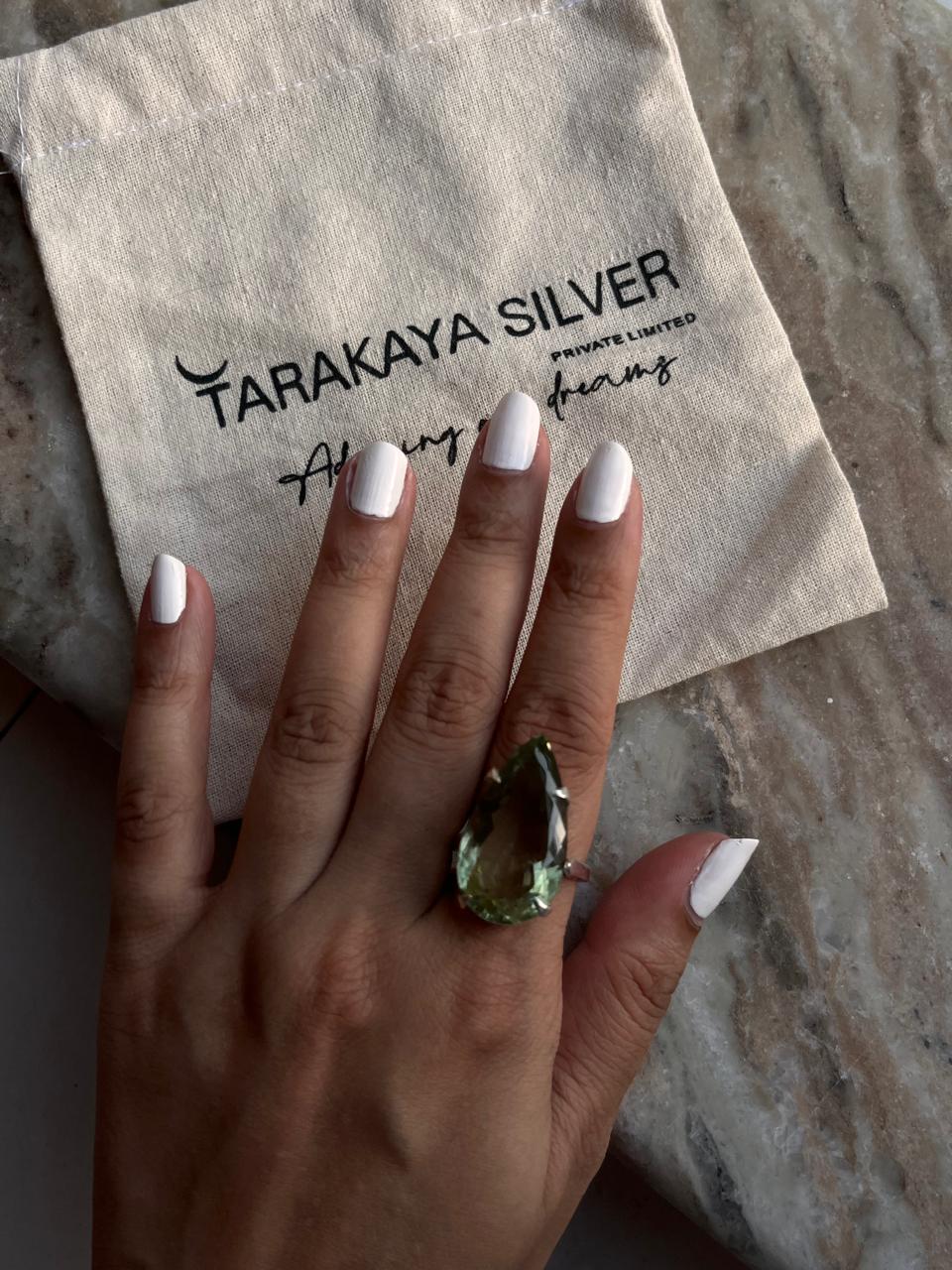 Handcrafted solitaire ring with green amethyst in 925 silver