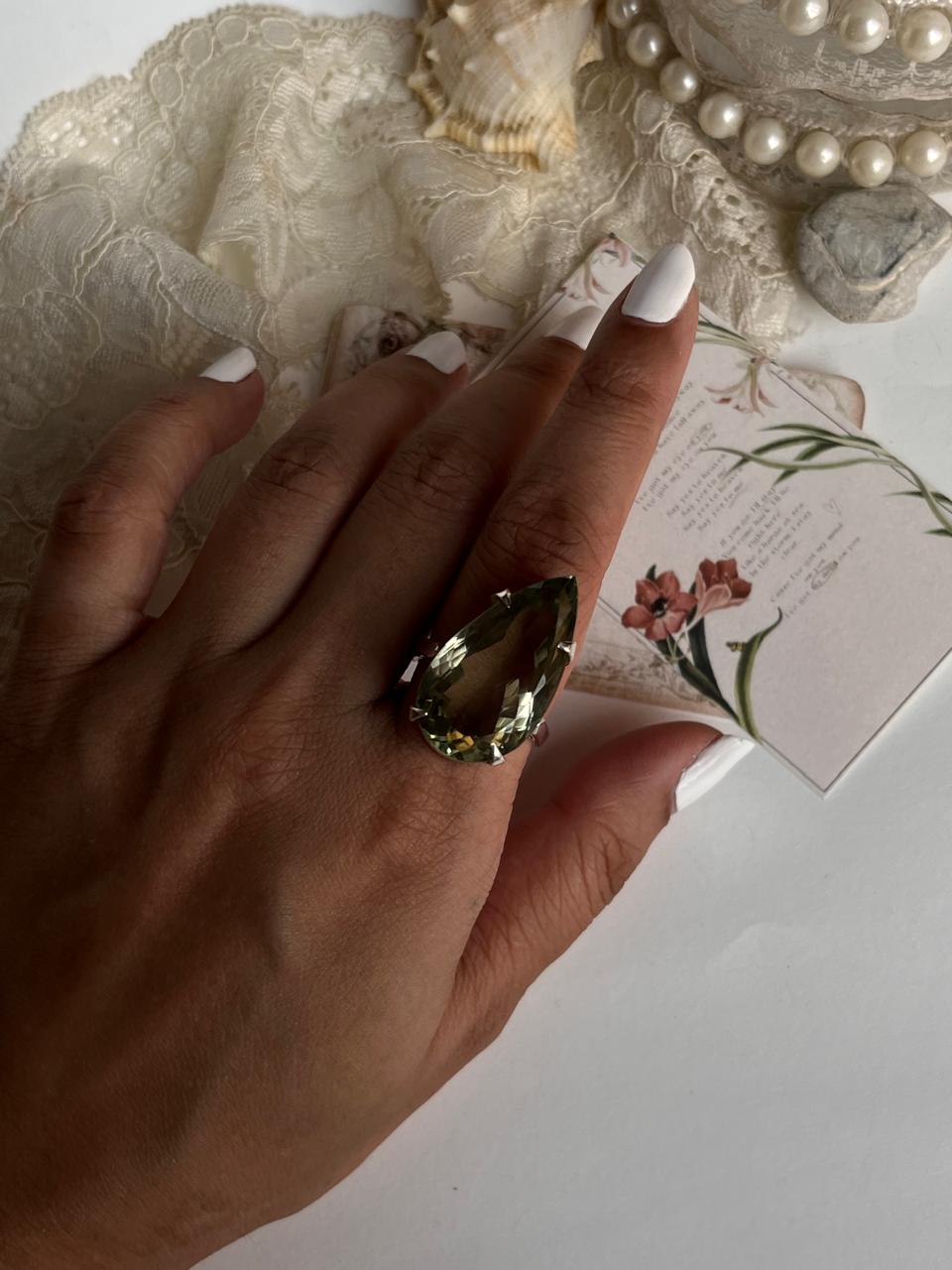 Sterling silver solitaire ring with vibrant green amethyst