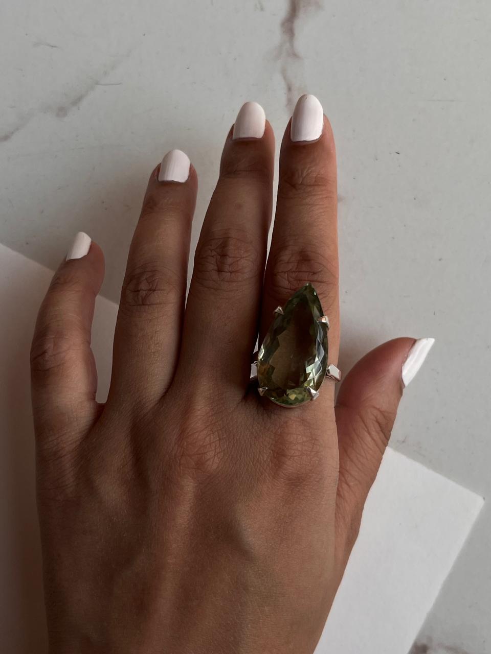 Sterling silver solitaire ring with vibrant green amethyst