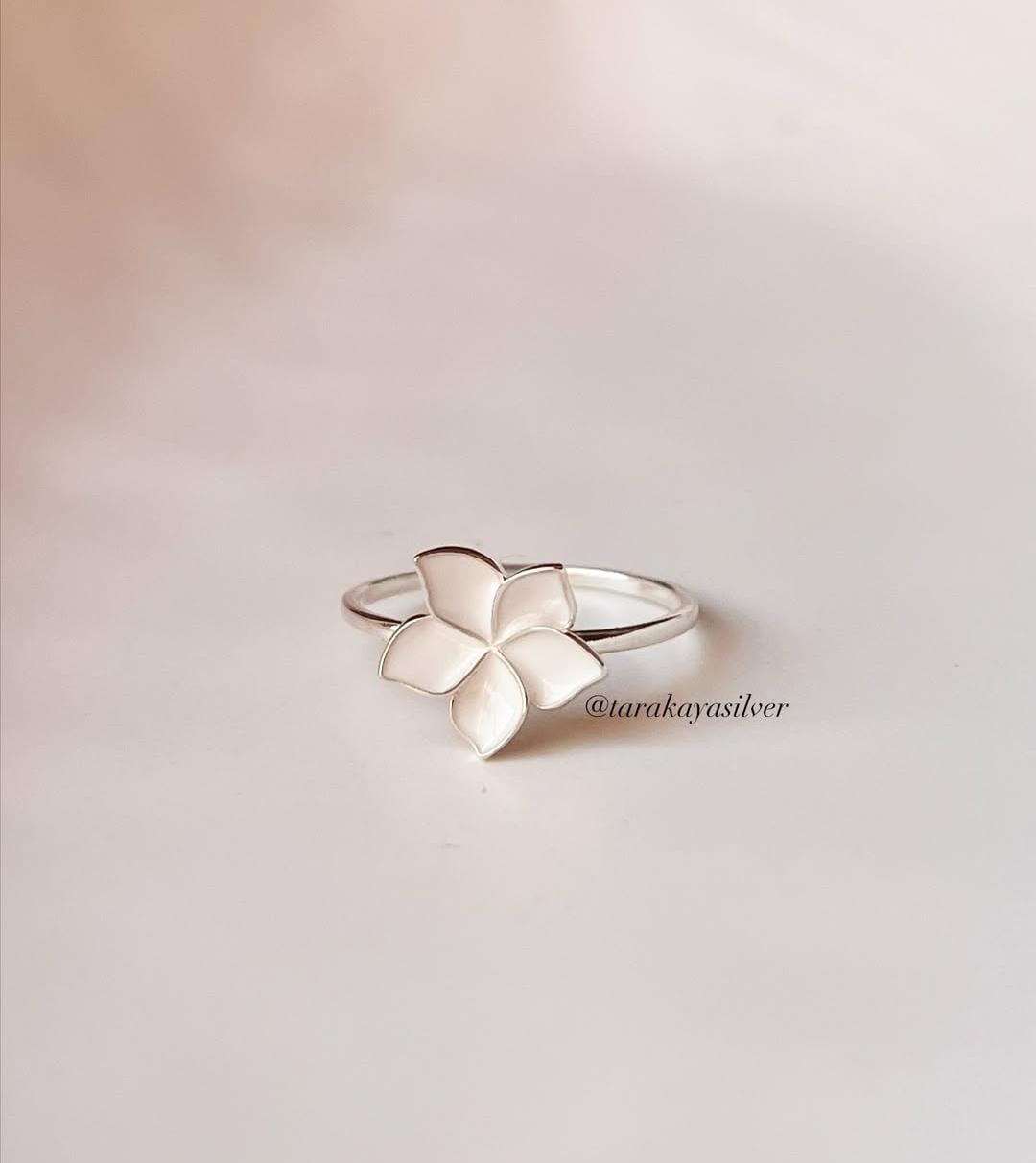 Sterling silver plumeria flower ring with white enamel petals