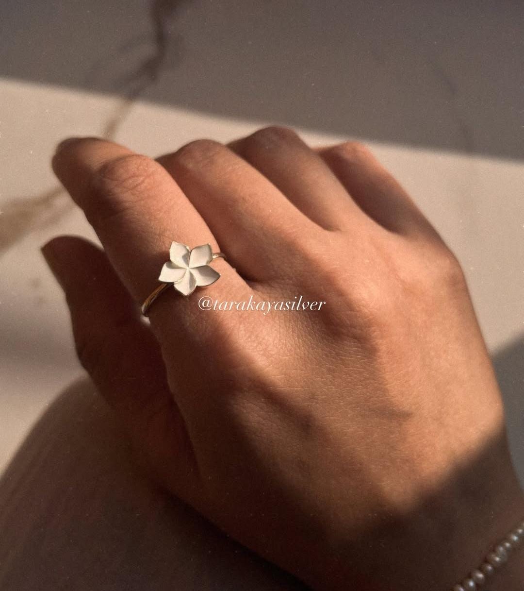 Plumeria blossom enamel ring in sterling silver